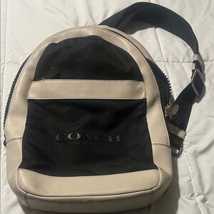 Coach sling back pack. Cream and black